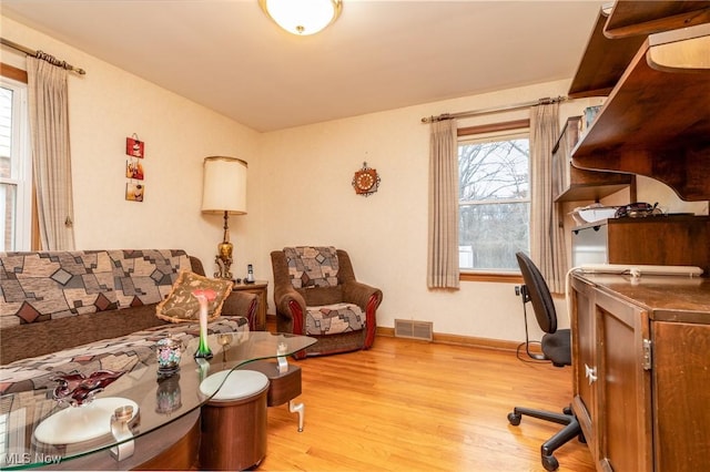 living room with light wood-type flooring