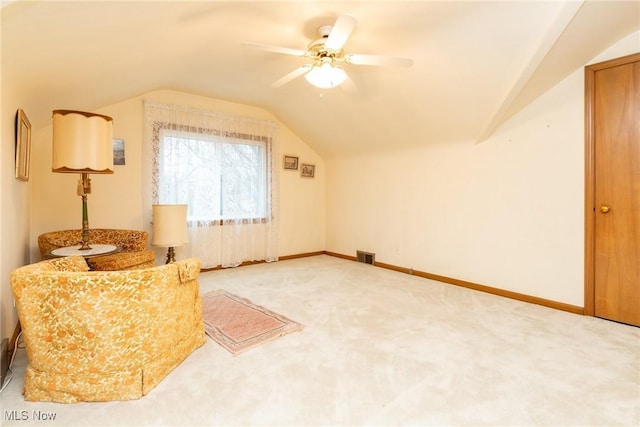 additional living space featuring vaulted ceiling, ceiling fan, and carpet flooring