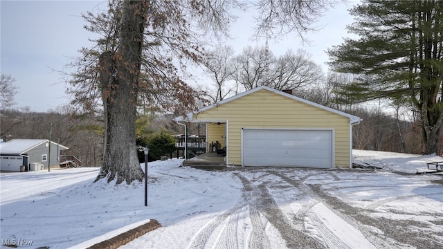 view of snow covered garage