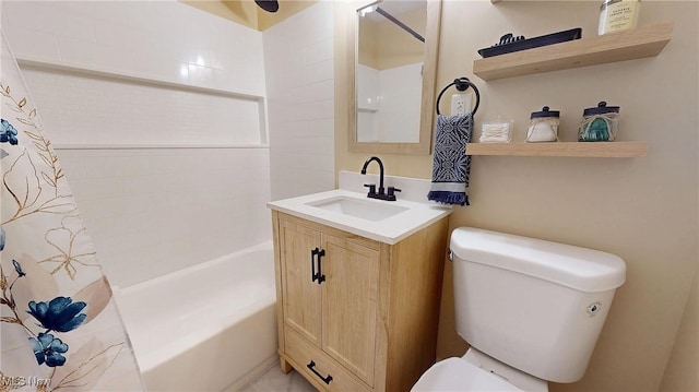 full bathroom with shower / bath combo, vanity, and toilet