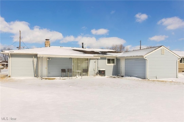 view of snow covered property