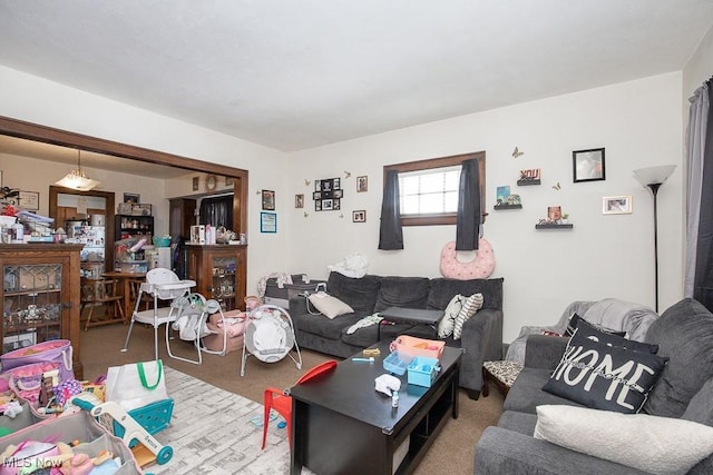 living room featuring light colored carpet