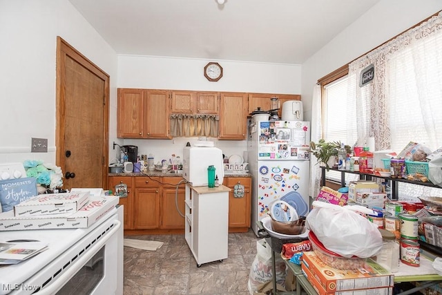 kitchen with white fridge