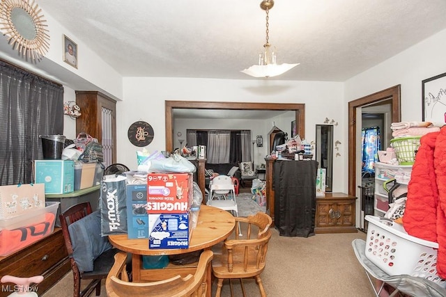 dining area with carpet flooring