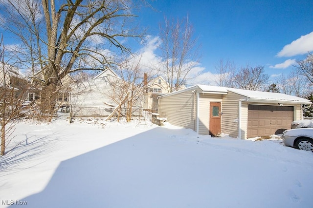 exterior space featuring a garage