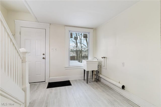 interior space with light hardwood / wood-style flooring