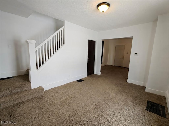 unfurnished room with carpet