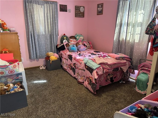 bedroom featuring carpet flooring