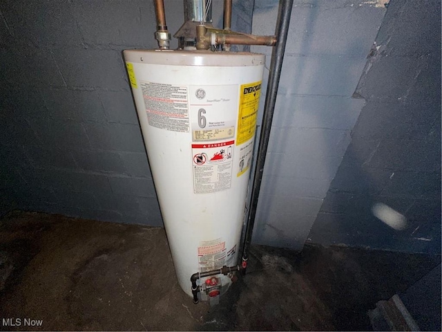 utility room with water heater