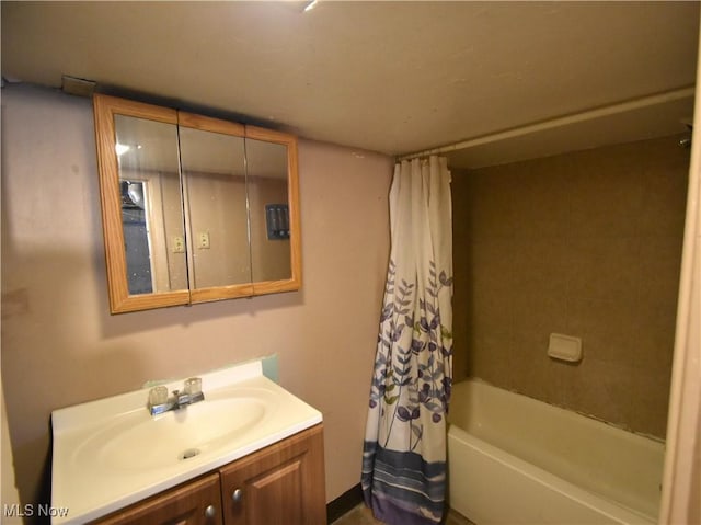 bathroom featuring vanity and shower / bath combo