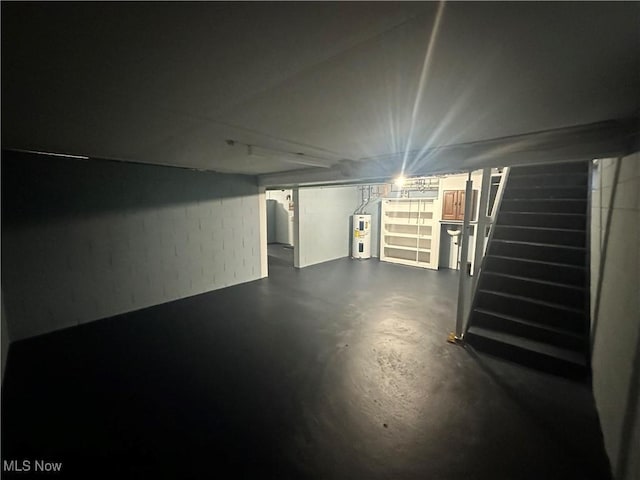 1425 Flint Ridge Rd, Hopewell, OH 43746 - basement featuring electric water heater