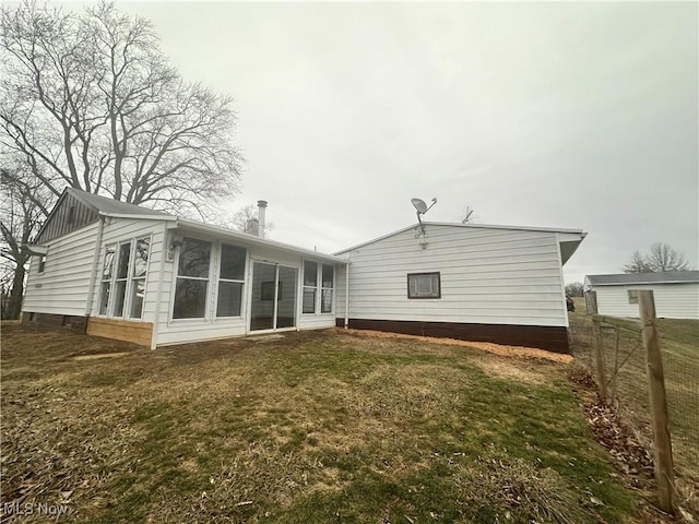 1425 Flint Ridge Rd, Hopewell, OH 43746 - back of property featuring a yard and a sunroom
