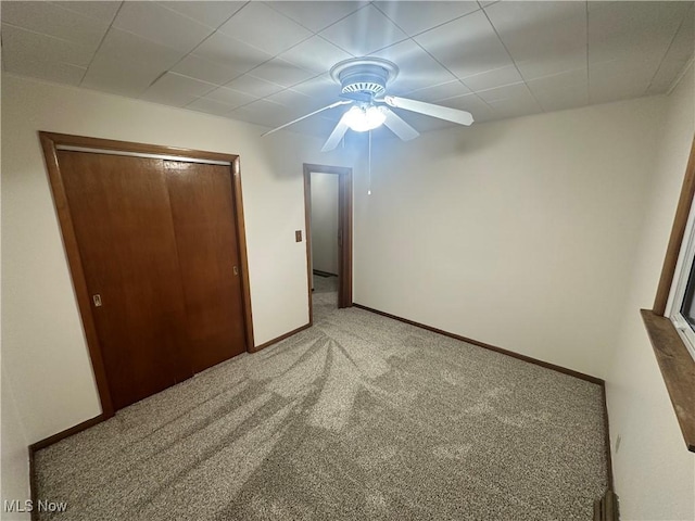 1425 Flint Ridge Rd, Hopewell, OH 43746 - unfurnished bedroom with a closet, ceiling fan, and carpet floors