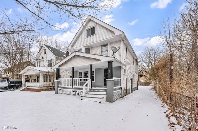 view of front of property featuring covered porch