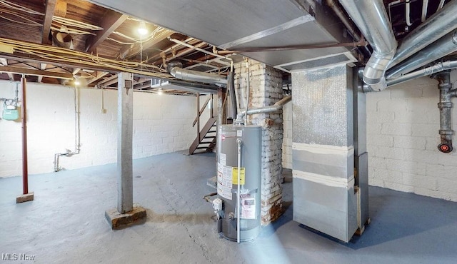 basement featuring heating unit and gas water heater