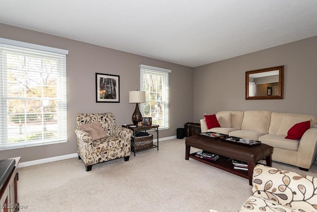 carpeted living room with plenty of natural light