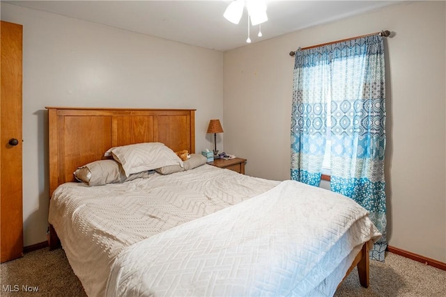 bedroom featuring carpet