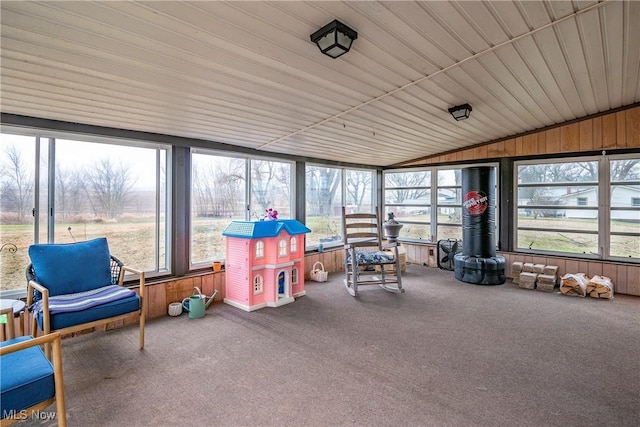 sunroom featuring lofted ceiling