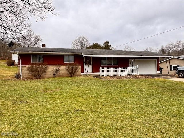 single story home featuring a front yard and a garage