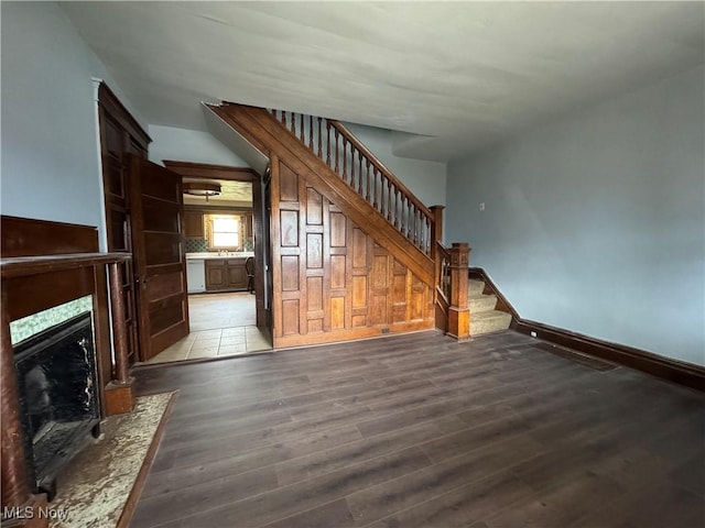 unfurnished living room with light hardwood / wood-style floors