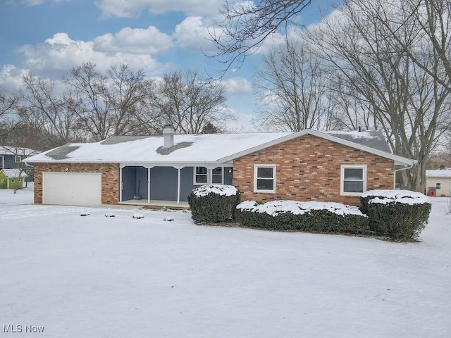 ranch-style home with a garage