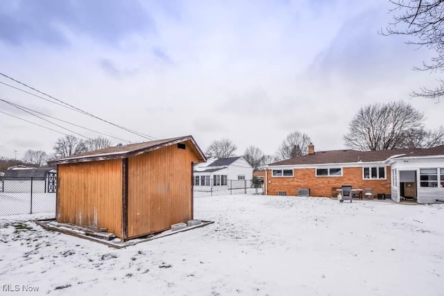 view of yard covered in snow