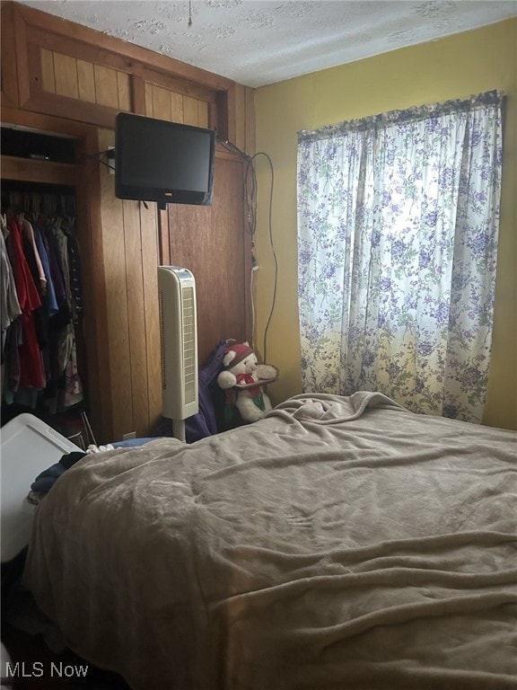 bedroom with a textured ceiling