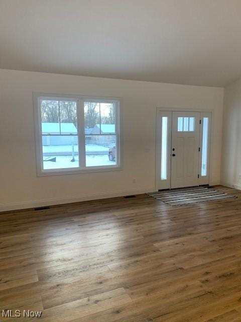 1775 Green Rd, Madison, OH 44057 - foyer featuring baseboards and wood finished floors