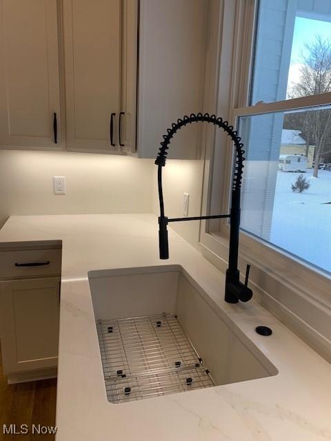 1775 Green Rd, Madison, OH 44057 - kitchen view of a sink and light countertops
