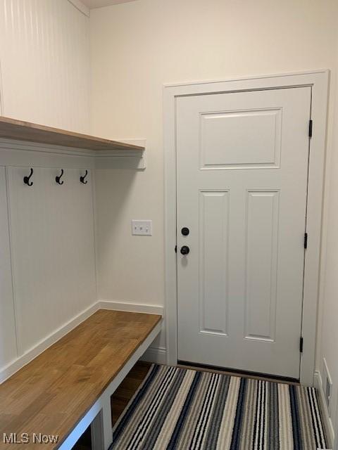 mudroom featuring baseboards and visible vents