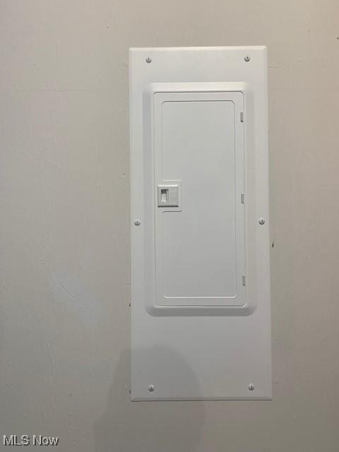 utility room featuring electric panel