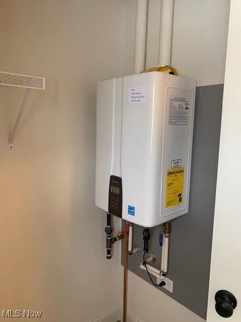 1775 Green Rd, Madison, OH 44057 - detailed view of water heater and baseboards