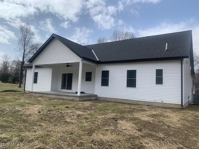 1775 Green Rd, Madison, OH 44057 - back of house featuring ceiling fan and roof with shingles