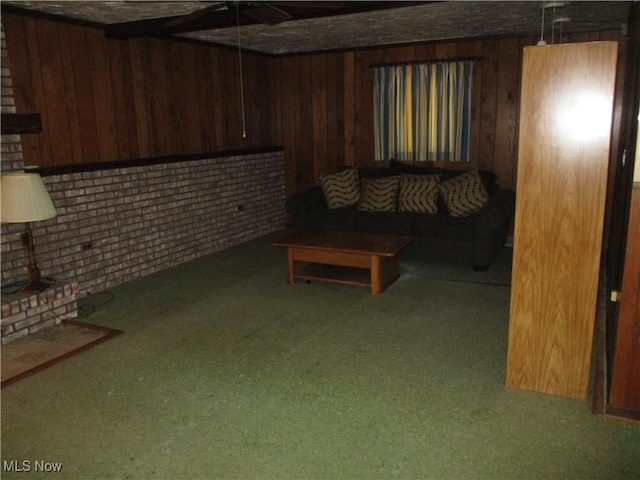 4520 E Wallings Rd, Broadview Heights, OH 44147 - below grade area with wooden walls, carpet flooring, and brick wall