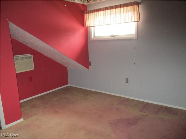 4520 E Wallings Rd, Broadview Heights, OH 44147 - below grade area with carpet flooring, a wall unit AC, and baseboards