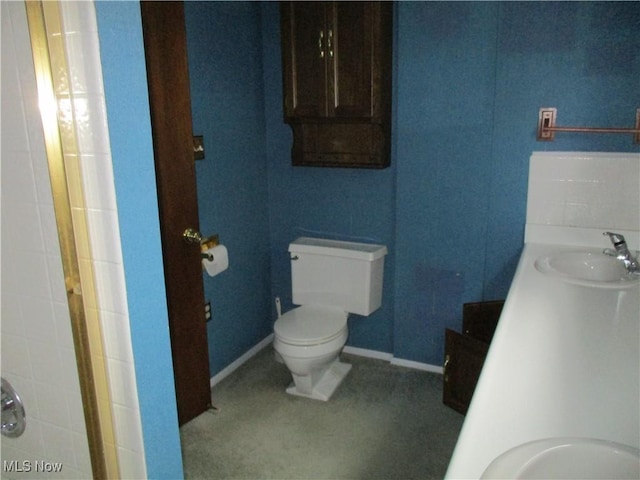 4520 E Wallings Rd, Broadview Heights, OH 44147 - bathroom with toilet, baseboards, and vanity