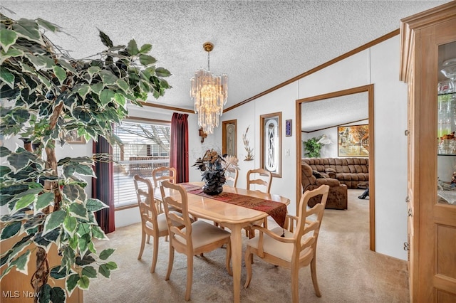 dining room featuring a textured ceiling, light carpet, crown molding, and an inviting chandelier