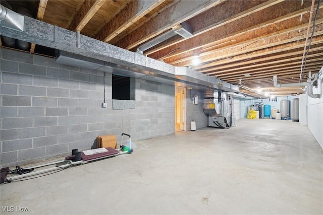 basement featuring heating unit