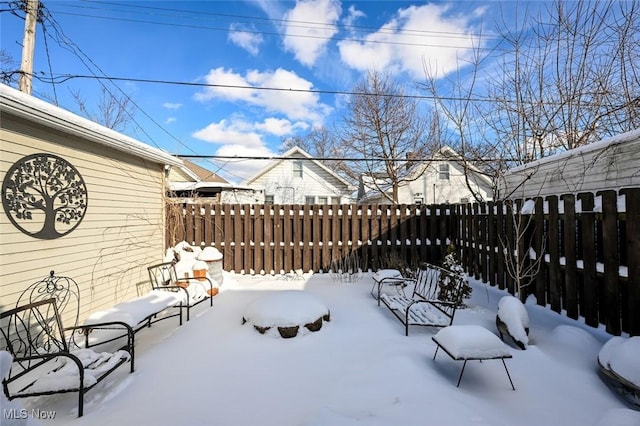 view of snow covered patio