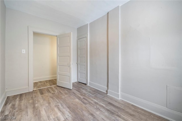 unfurnished bedroom featuring light hardwood / wood-style flooring