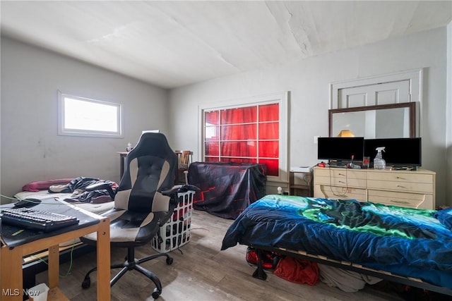 bedroom featuring hardwood / wood-style flooring