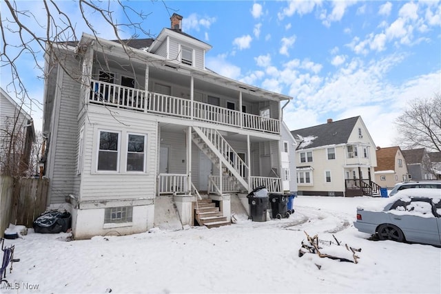 view of front of home with a balcony