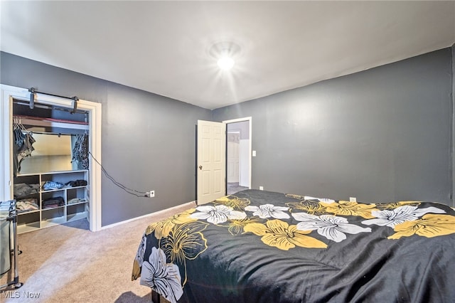 carpeted bedroom featuring a closet