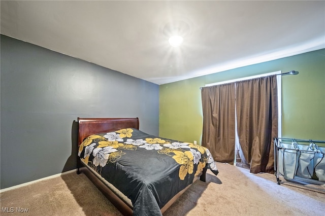 bedroom featuring carpet flooring