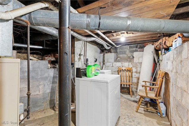 basement with separate washer and dryer