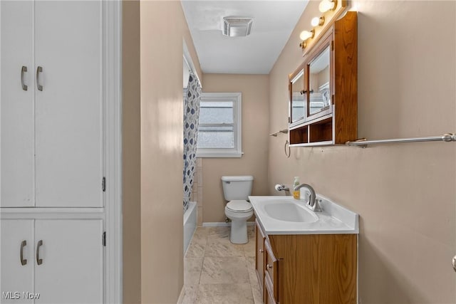 full bathroom with toilet, vanity, and shower / bath combination with curtain