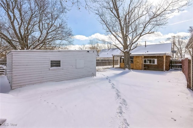 view of yard covered in snow