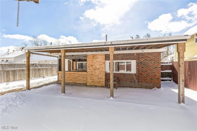 view of snow covered patio