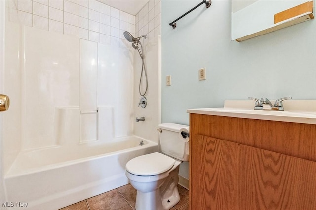 full bathroom with tile patterned floors, shower / bath combination, vanity, and toilet