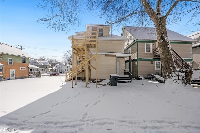 view of snow covered property